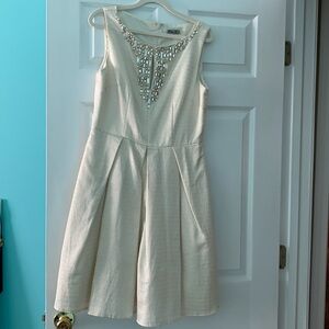 Eliza J cream with gold lurex fit and flare dress.